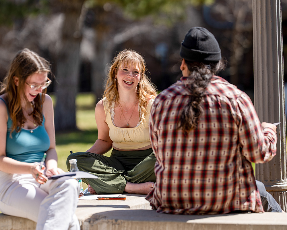 A student receives assistance from an academics advisor.