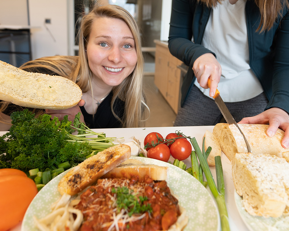 A student preparing a home-cooked meal