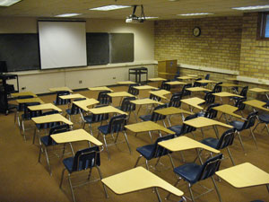 Classroom with level seating and movable tab arm chairs